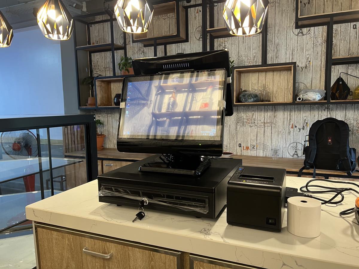 DKSC POS terminal at a café counter in Phnom Penh