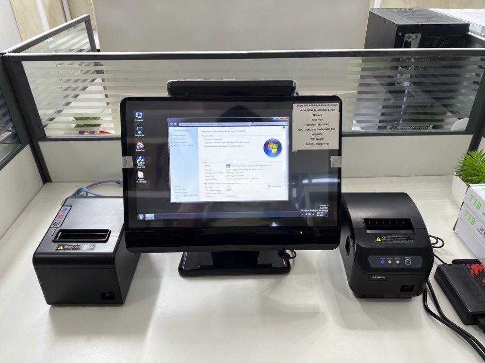 Dual-screen POS terminal on a service counter